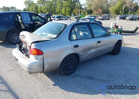 1998 Toyota Corolla Le z USA, uszkodzony, nr VIN 2T1BR18E5WC004581